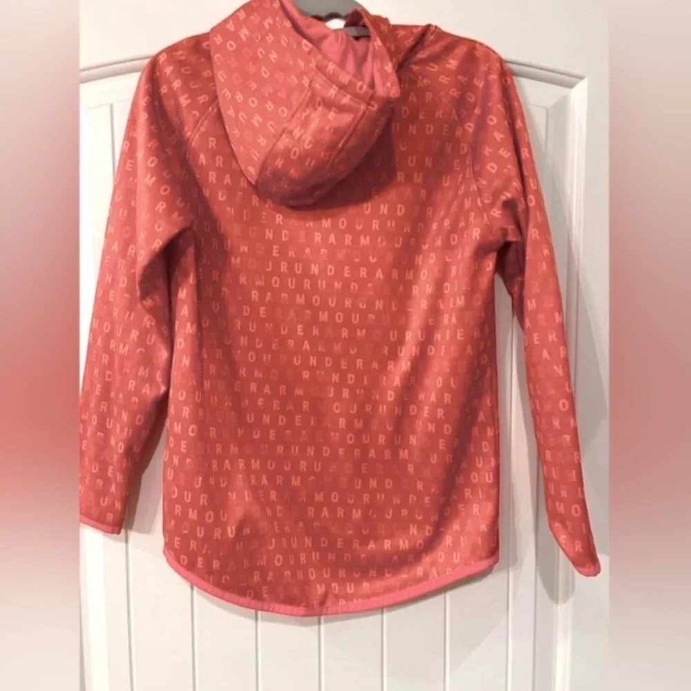 UNDER ARMOUR -   All Over Print Fleece Hoodie- youth size large- salmon color